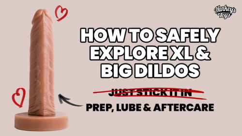 Tan silicone XL dildo from Hankey's Toys displayed on base with text overlay: "How to Safely Explore XL & Big Dildos – Prep, Lube & Aftercare" and heart icons