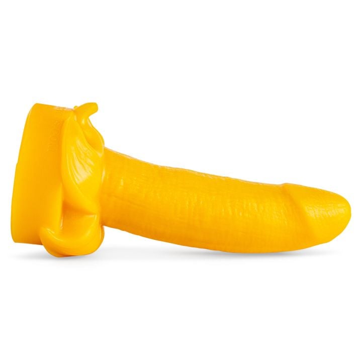 Side view of realistic Golden Yellow Banana Dildo laying horizontally, with detailed peeled base and textured shaft, fantasy sex toy design