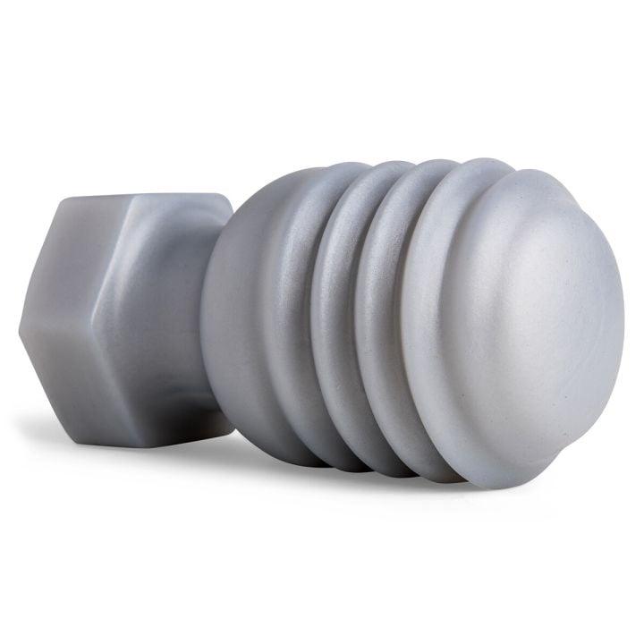 Angled image of the Butt Bolt Plug displaying its handcrafted silicone body and bold, sculpted shaft, designed for intense stretching sensations.