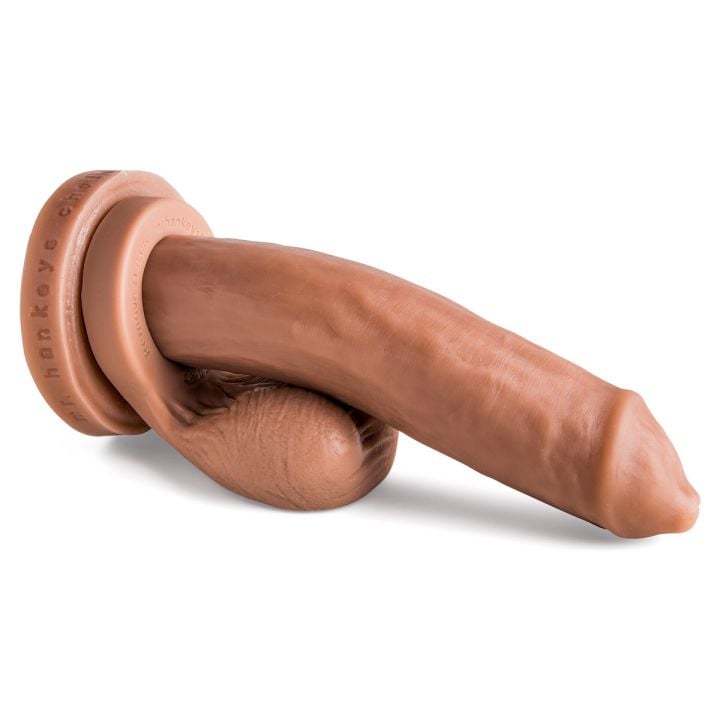 Artistic shot of Cholo dildo paired with Remove-O-Balls (sold separately), emphasizing customization options for an ultra-realistic experience.