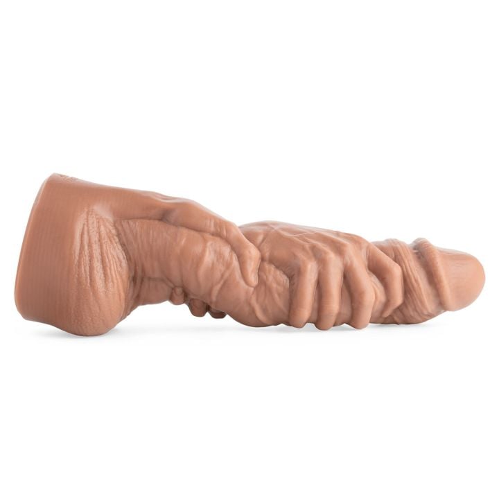 Full side profile of Dana’s Grip fisting dildo in Natural Tan, showcasing realistic hand-grip design and textured shaft for deep penetration and intense stretch.