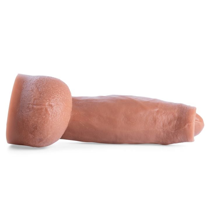 Duke Uncut Dildo laying flat to display its handcrafted shape, premium silicone finish, and anatomical accuracy for realistic penetration.