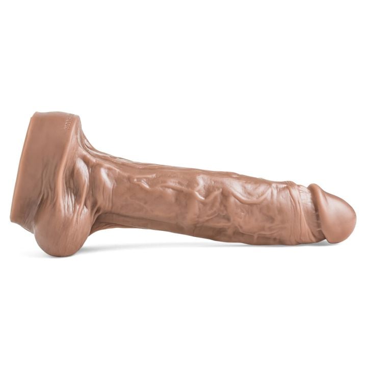 Side view of Lampwick dildo showcasing its veined shaft and natural curvature, perfect for deep, realistic penetration.