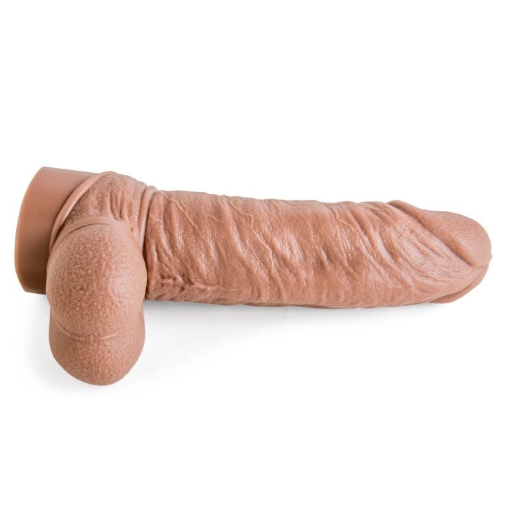 Underside view of Latin Lover dildo showcasing lifelike ridges, veins, and realistic base design for passionate encounters.