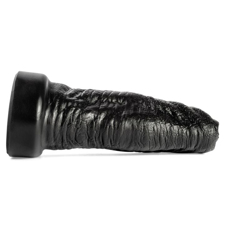 Ogre silicone dildo by Mr. Hankey’s Toys laying flat, profile view showcasing thick shaft, fantasy-inspired textures, and oversized head in Black silicone finish.