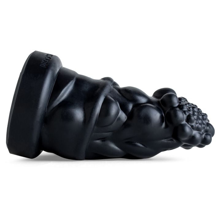 Prince Charming silicone dildo laying on its side, close-up of textured head and bold ridges in Black, designed for deep stretch and sensory stimulation.