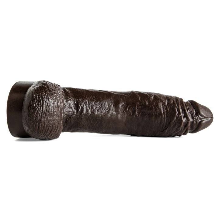 Ray Diesel dildo lying flat, showing length and full-body texture for users seeking bold realism and stretch stimulation.