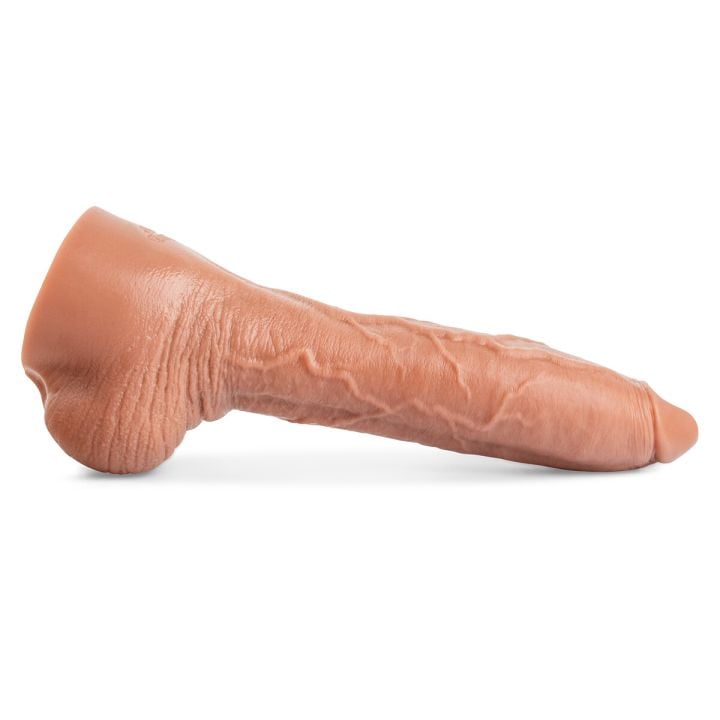 Side view of Thiago dildo in Natural Tan showing detailed veins and handcrafted realistic texture.