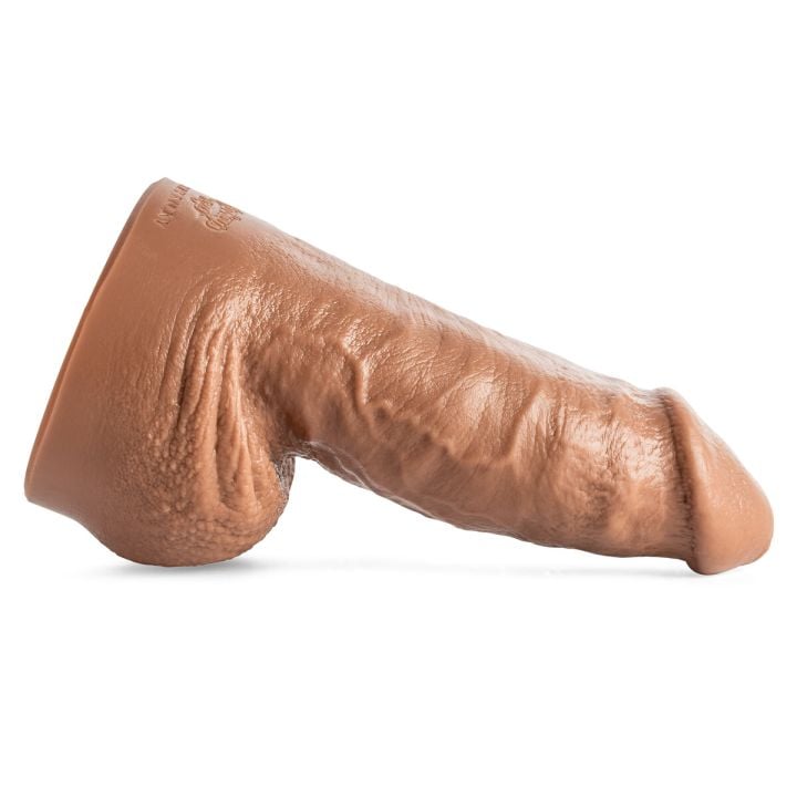 Side profile of the Thicky Nicky short thick dildo highlighting realistic vein textures and girthy shaft for full-bodied pleasure.