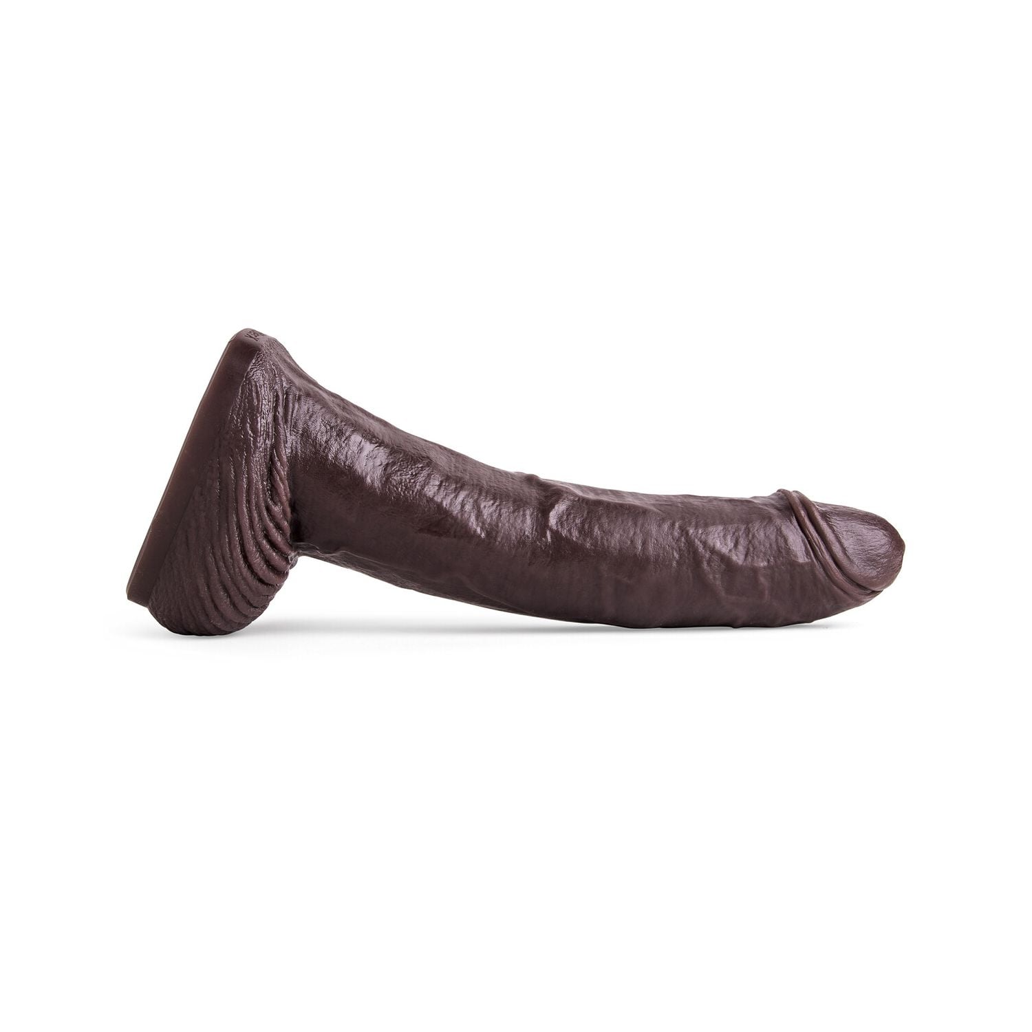 Full side profile of the Cutler X Dildo, showcasing its lifecast contours, thick shaft, and sculpted head crafted from body-safe platinum-cured silicone.