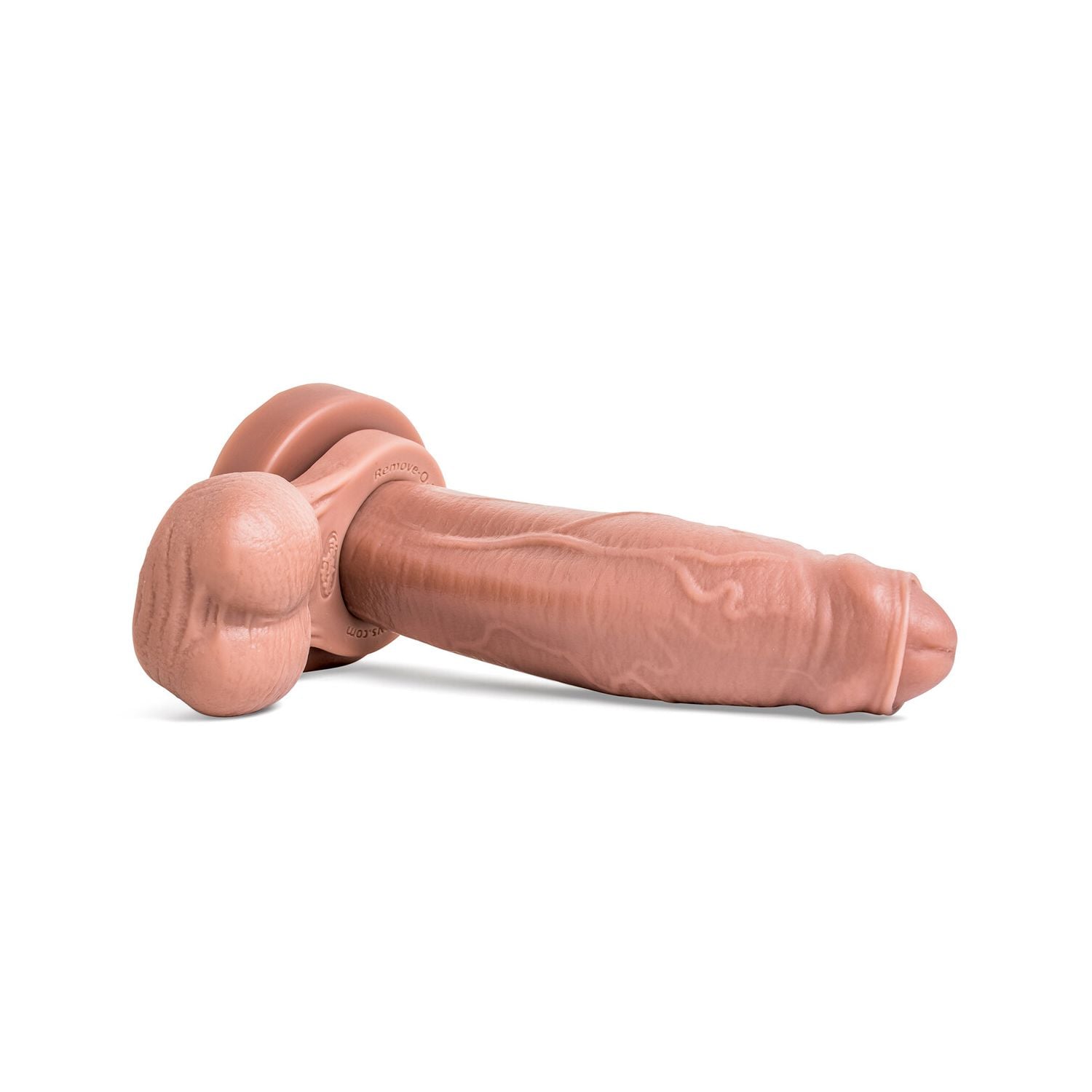 El Rey Realistic Dildo in Natural Tan color, showcasing its pronounced uncut head and textured shaft for lifelike sensation pictured with Remove-o-Balls sold seperately.