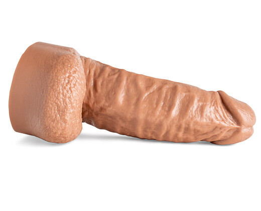 A close up of Hankey's Toys Cockmaker dildo that is thick, and a light skin toned dildo 