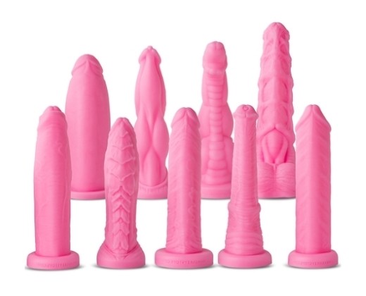 Group display of XTRA Small Dildo Series I in bubblegum pink showing the full collection of petite fantasy dildos by Mr. Hankey’s Toys.