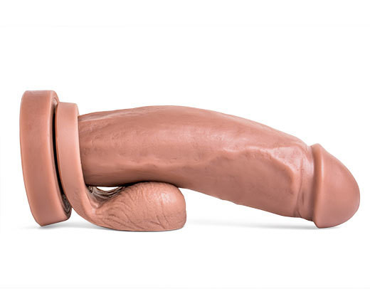 The XXXPLORER fantasy dildo by Mr. Hankey’s Toys displayed horizontally with the detachable Remove-O-Balls accessory attached, showcasing its lifelike texture and premium silicone craftsmanship.