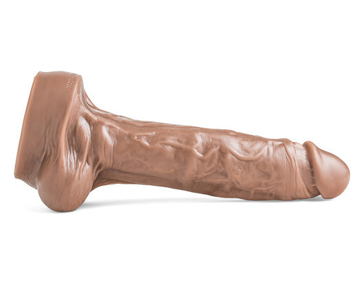 Side view of Lampwick dildo showcasing its veined shaft and natural curvature, perfect for deep, realistic penetration.