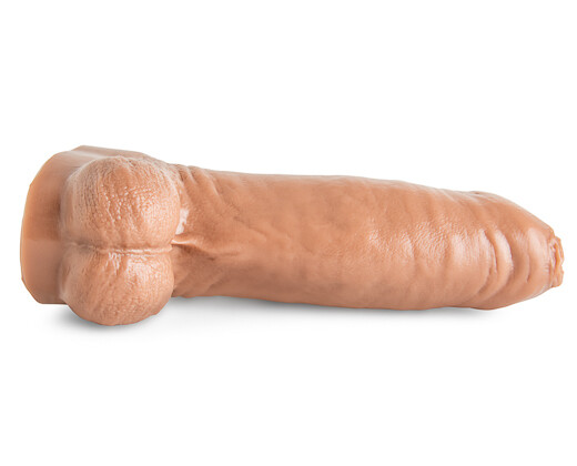 Lifelike display of Chorizo N’ Eggs dildo showing sculpted realism and robust build for maximum stretch and satisfaction during play.