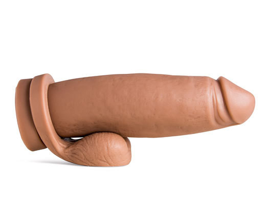 Boss Hog dildo in Natural Tan laying horizontally, side profile showing wide shaft, realistic veins, and optional Remove-O-Balls at base