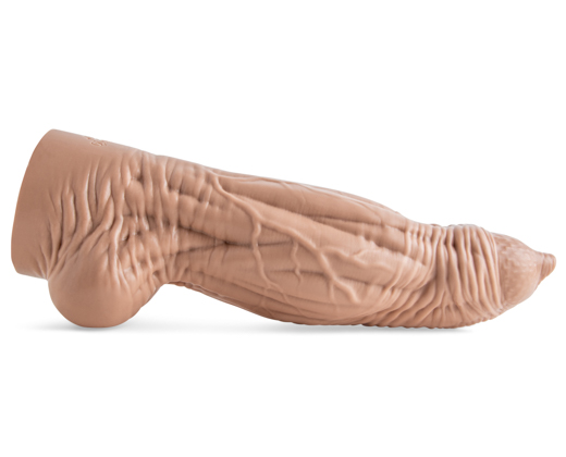 Side profile of the Rule 34: Cat Dildo in pale flesh tone, featuring textured wrinkles, feline-inspired curves, and lifelike sculpted detail.