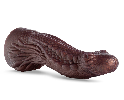 Close-up of the head and upper shaft of the Dildos & Dragons dildo, emphasizing its pointed tip and ridged dragon texture for fantasy stimulation.
