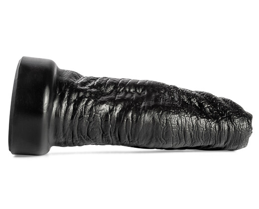 Ogre silicone dildo by Mr. Hankey’s Toys laying flat, profile view showcasing thick shaft, fantasy-inspired textures, and oversized head in Black silicone finish.